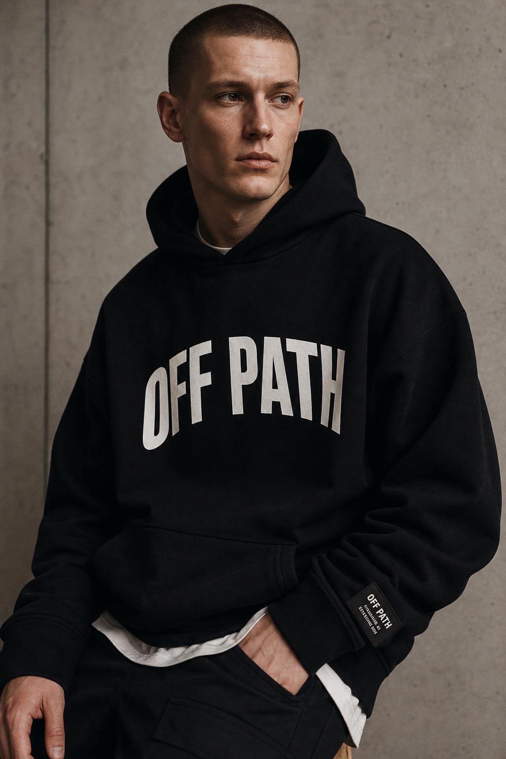 Male model wearing OFF PATH branded oversized hoodie